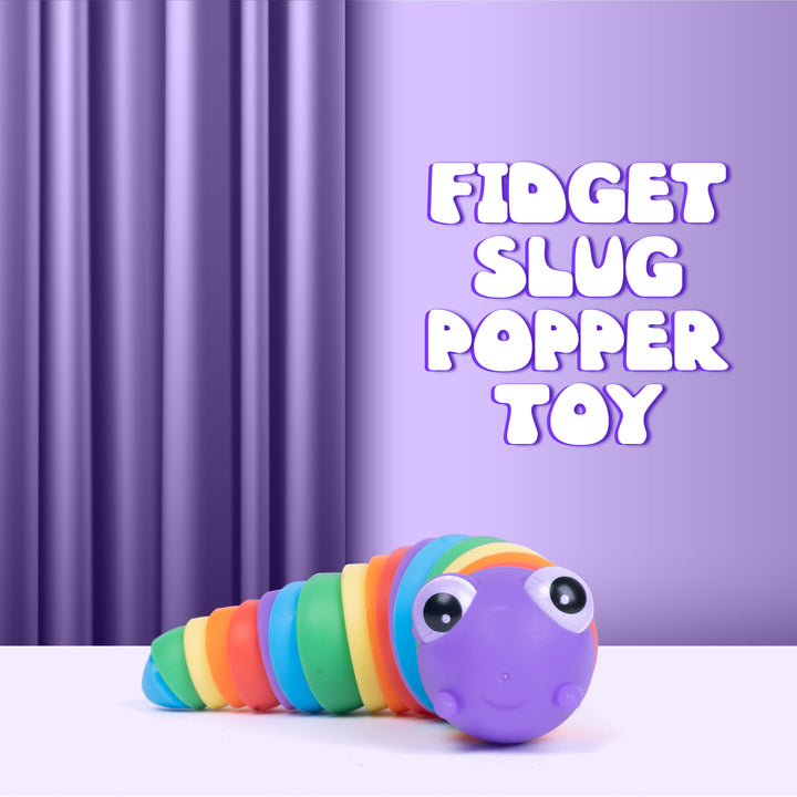 A colorful segmented fidget toy shaped like a caterpillar or slug, with a purple head and rainbow body segments, resting on a white surface against a purple curtain backdrop. Large white text on the right reads 'FIDGET SLUG POPPER TOY'.