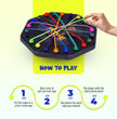 Kids playing FLYI Tangle Twister rope puzzle game with family
