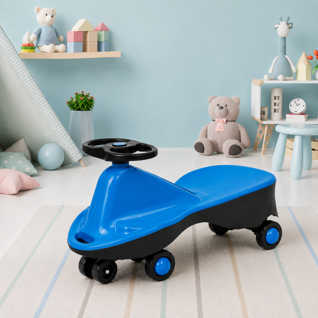 A blue and black children's (wiggle ride toy car) with a steering wheel, positioned in a styled children's room setting with toys and a light blue wall in the background.