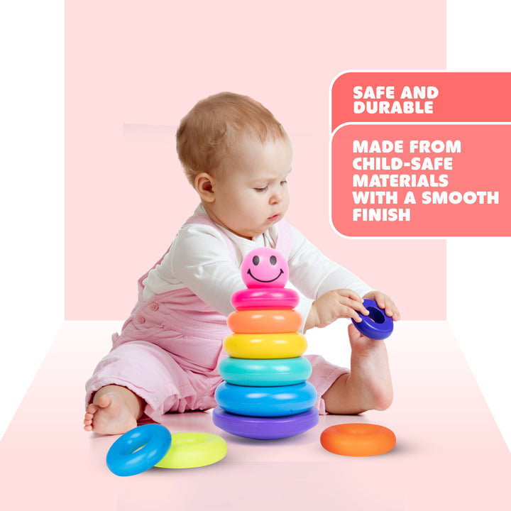 Child playing with FLYI smiley stacking rings toy during a hands-on activity.