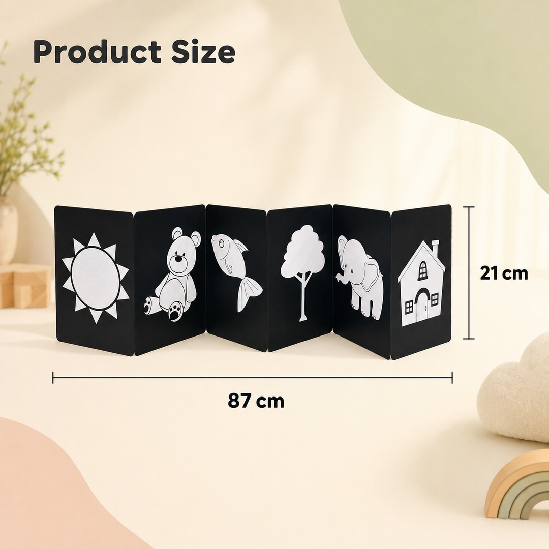 A black accordion-style children's book or toy with white animal and object illustrations, shown with dimension lines reading 87 cm wide and 21 cm tall on a soft beige background. The text 'Product Size' appears at the top.