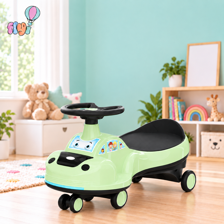 A light green and black toy car ride-on with a steering wheel, shown in a bright children's room setting.