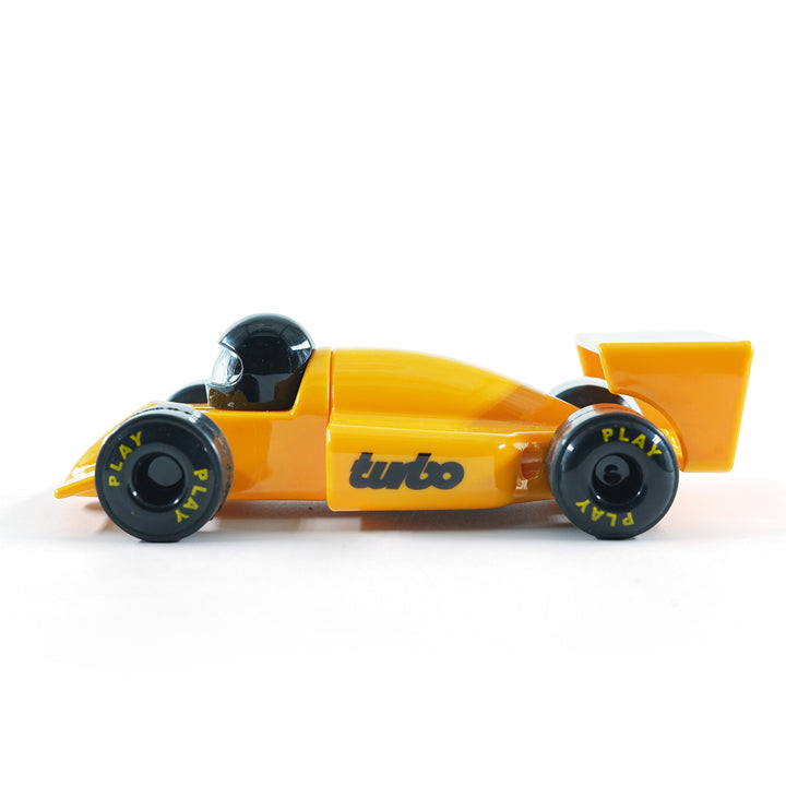 FLYI yellow toy race car with black wheels on a white background
